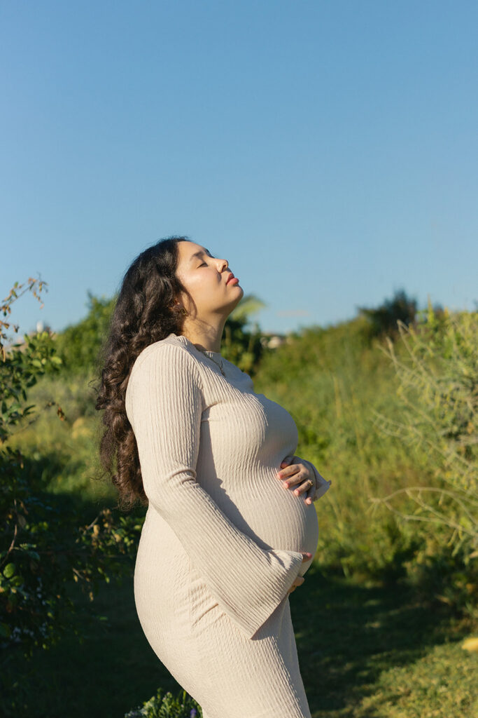 Natural light South Florida maternity photography portrait during golden hour.